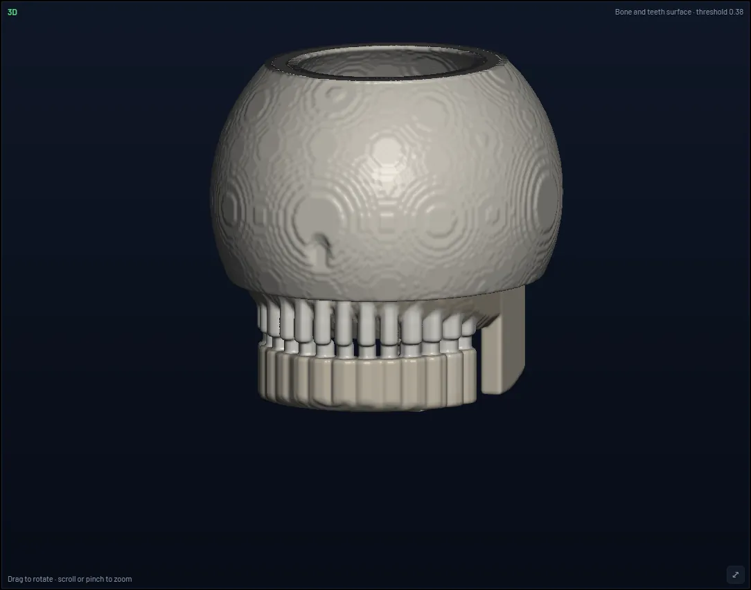 The 3D view of the demo test object, shown as a bone and teeth surface.